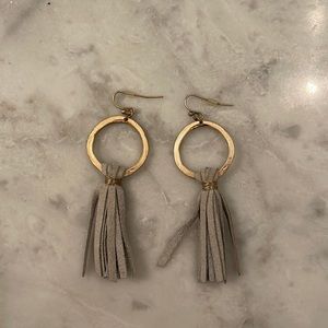 Leather wrapped tassel earrings.
